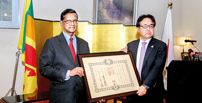 Sunil Gamini Wijesinha receives Order of the Rising Sun, Gold and Silver Rays 